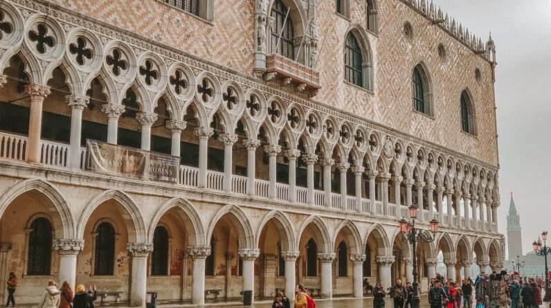 people walking in front Doge Palace